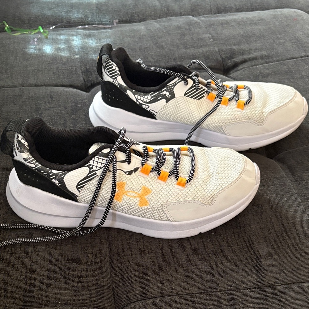 Under Armour White and Black Athletic Shoes with Orange Highlights